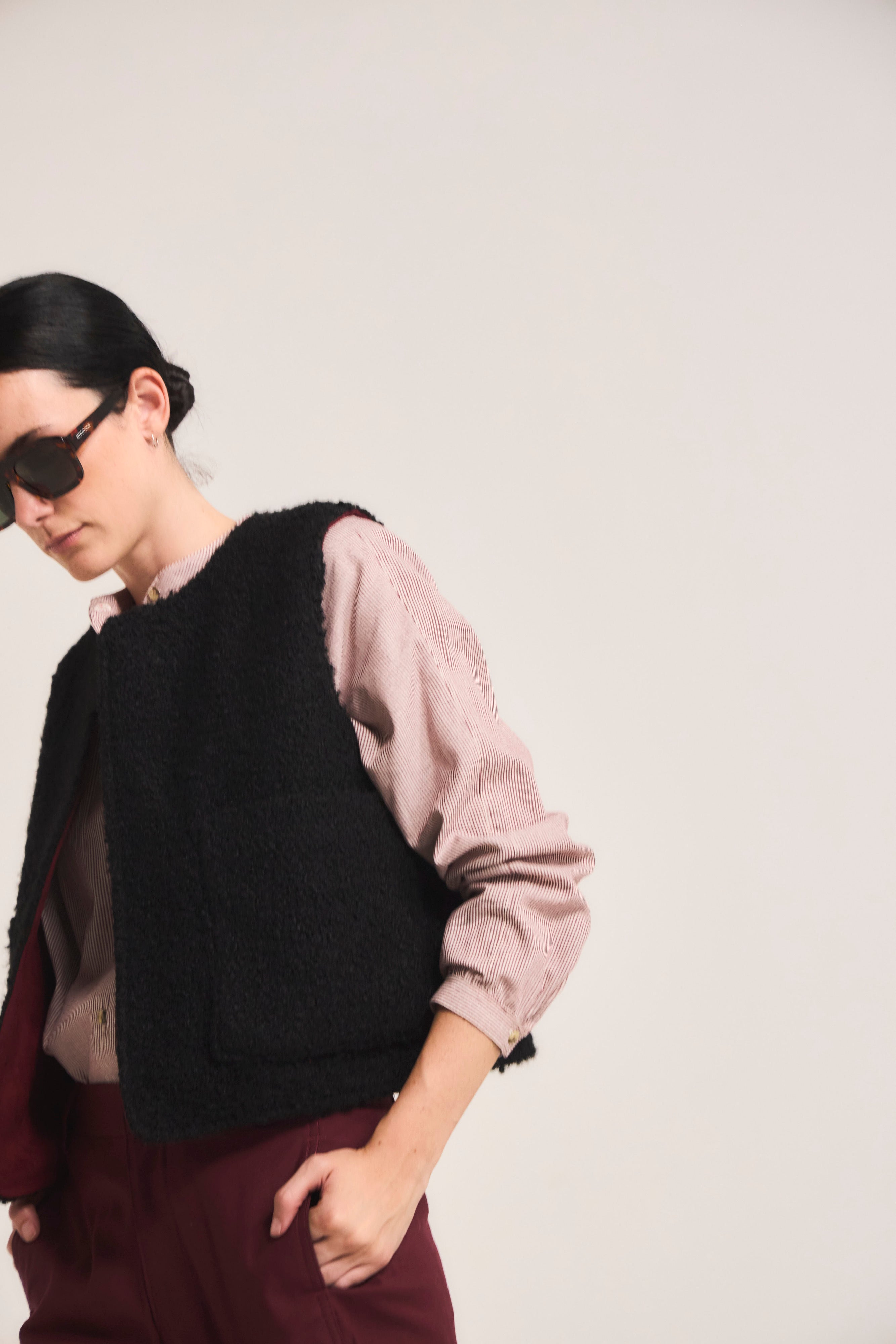 Gilet Reversible Infini Corderito Negro / Burdeo